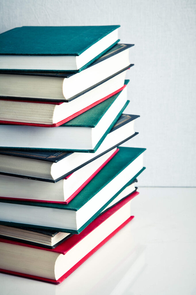 stack of books PHK9HTC scaled